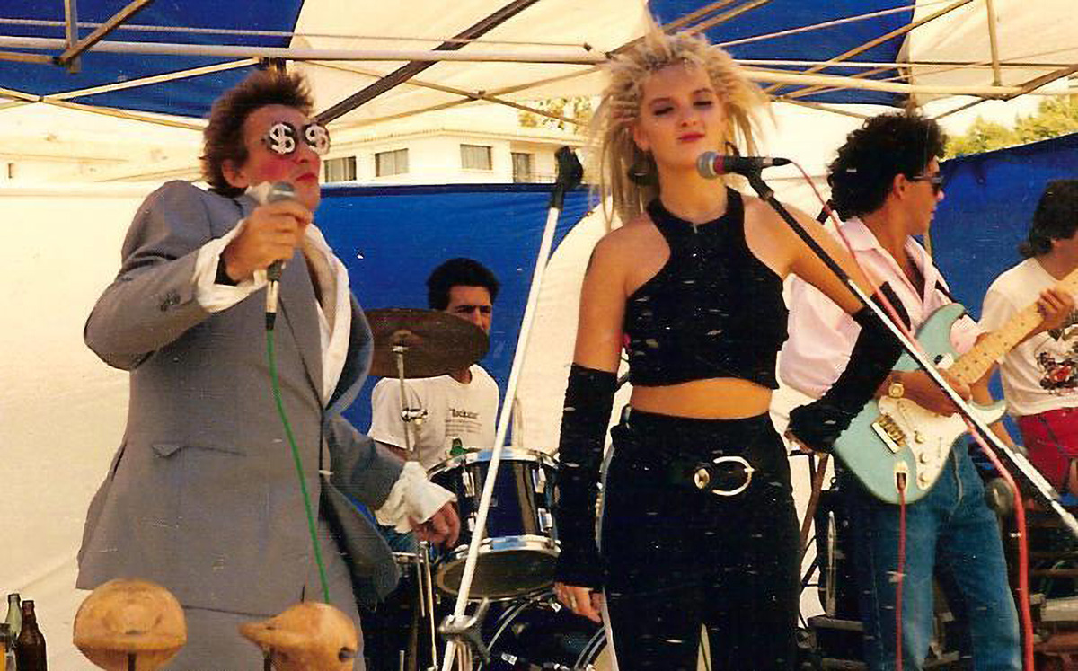 La Comedia performers Adam Baker and Tiffany bring eccentric 80s style to their beach gigs