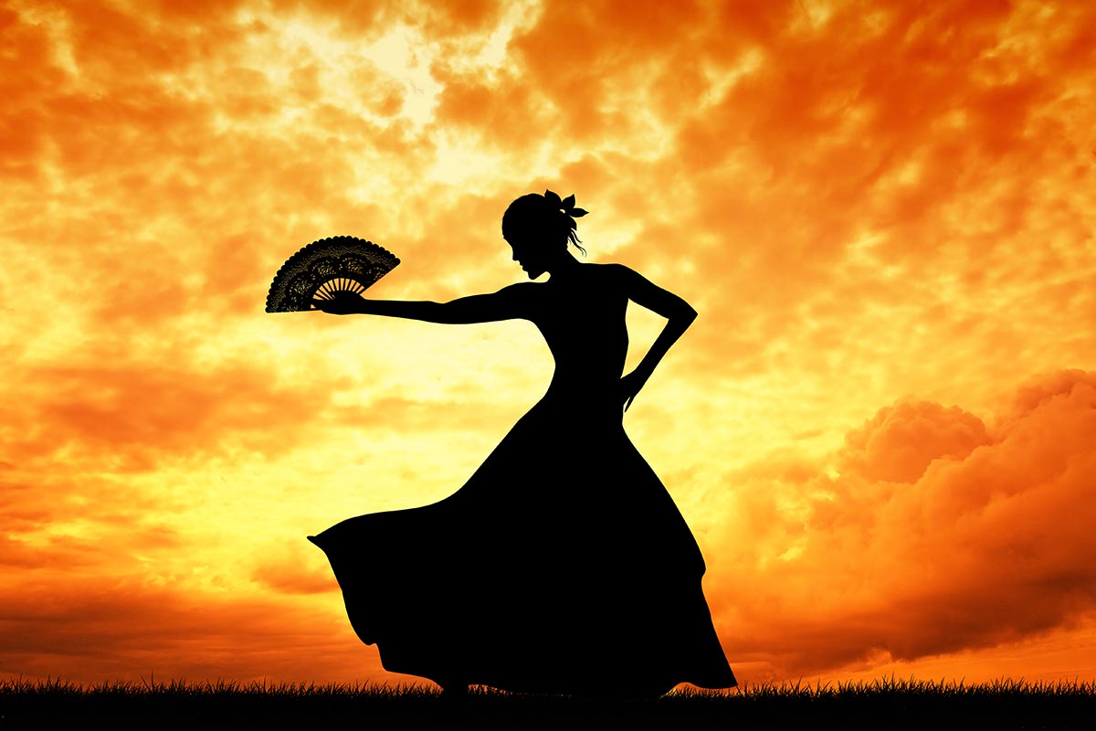 Silhouette of flamenco dancer at Sunset