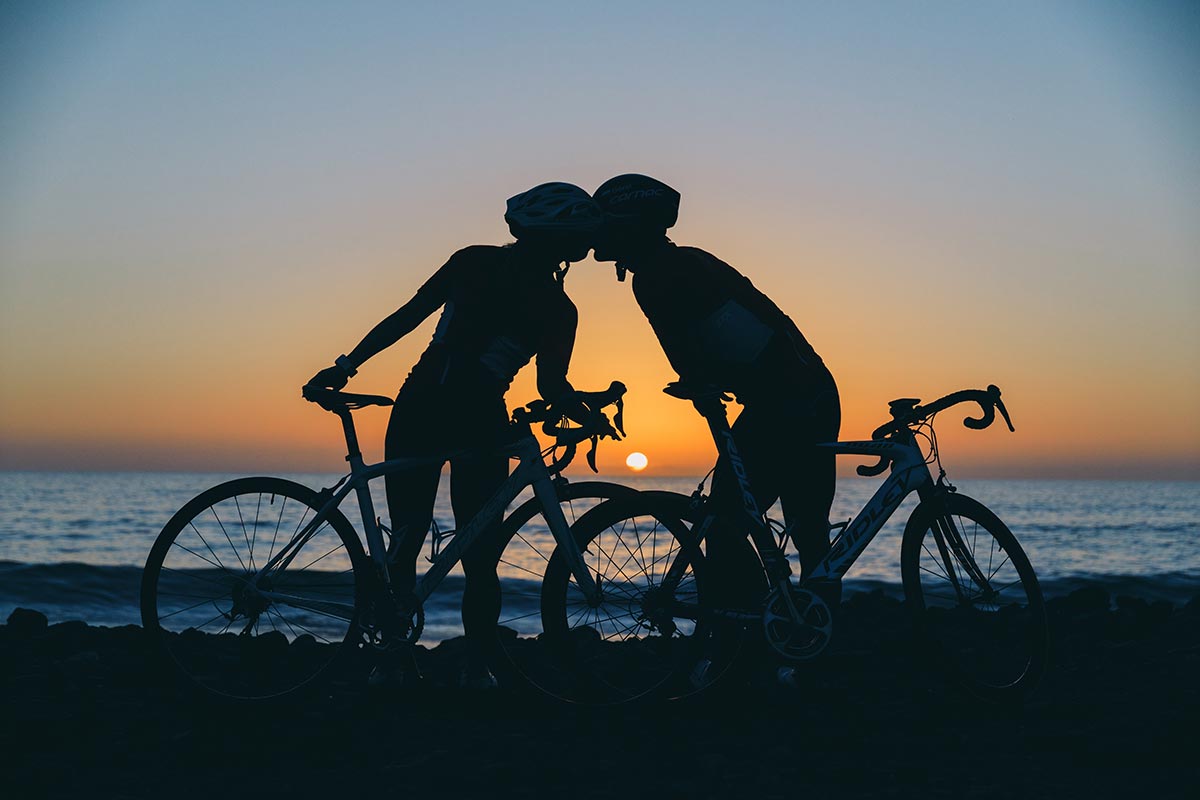 Bicycles on the beach at sunset