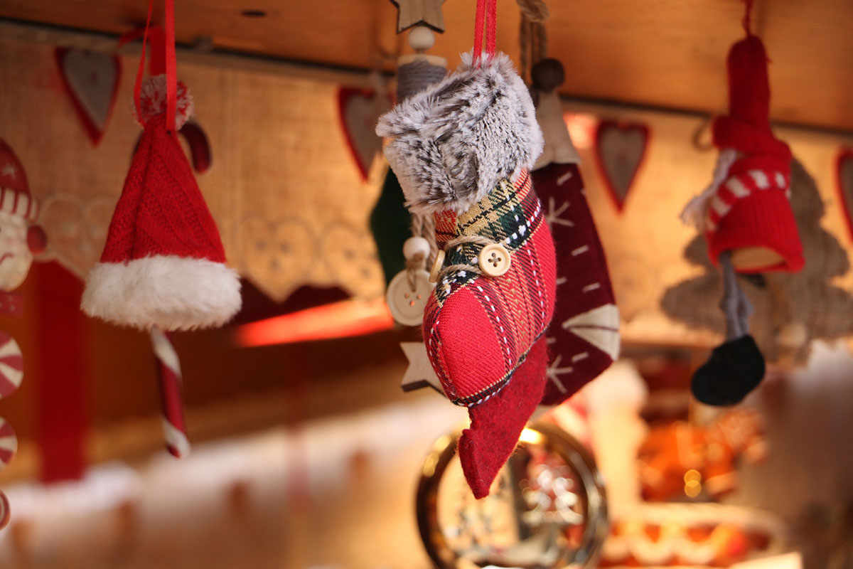 Christmas hats and socks hanging up.