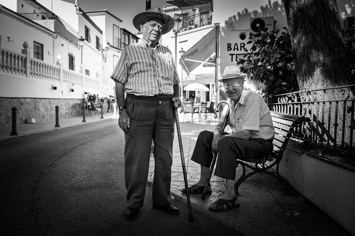 Two elderly me in the village.