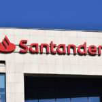 Red Santander sign on a building
