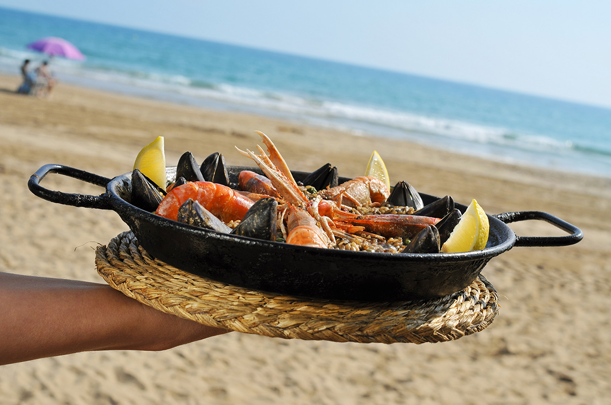 Traditional Spanish paella on the beach