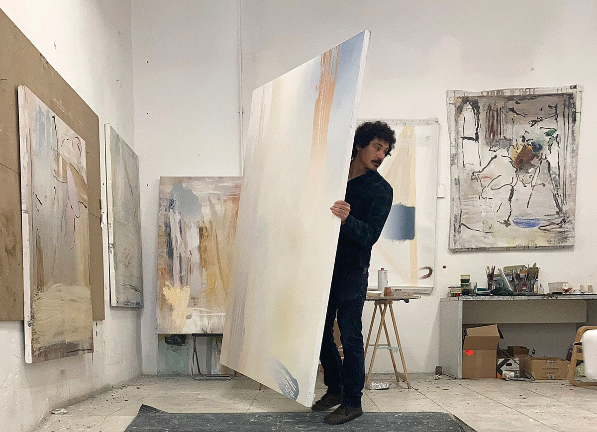 Artist Alan Sastre at work in his studio