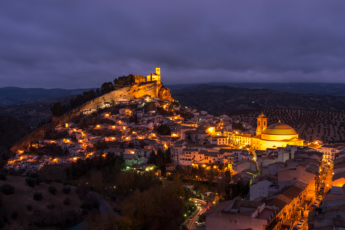 Classic photo of Montefrio castle and village by night